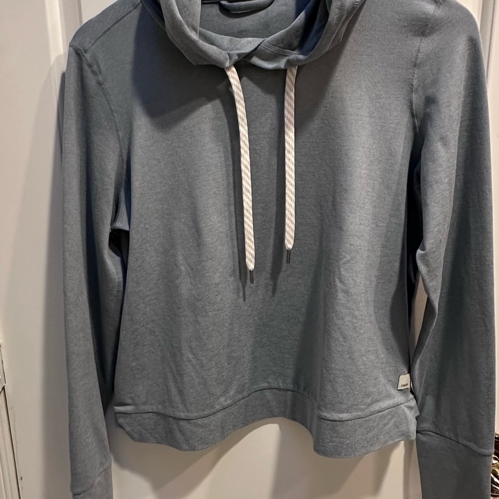 Vuori light blue hoodie with white drawstrings